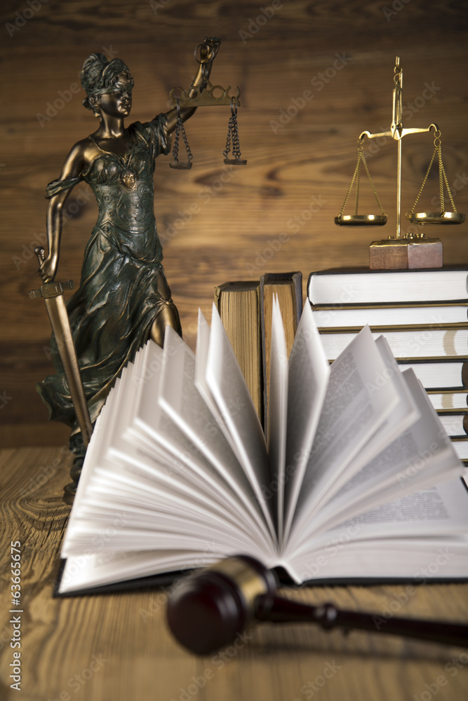 Naklejka premium Lady of justice, wooden & gold gavel and books on wooden table