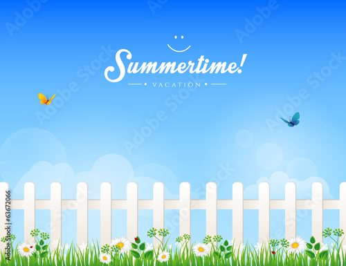 White fence with grass