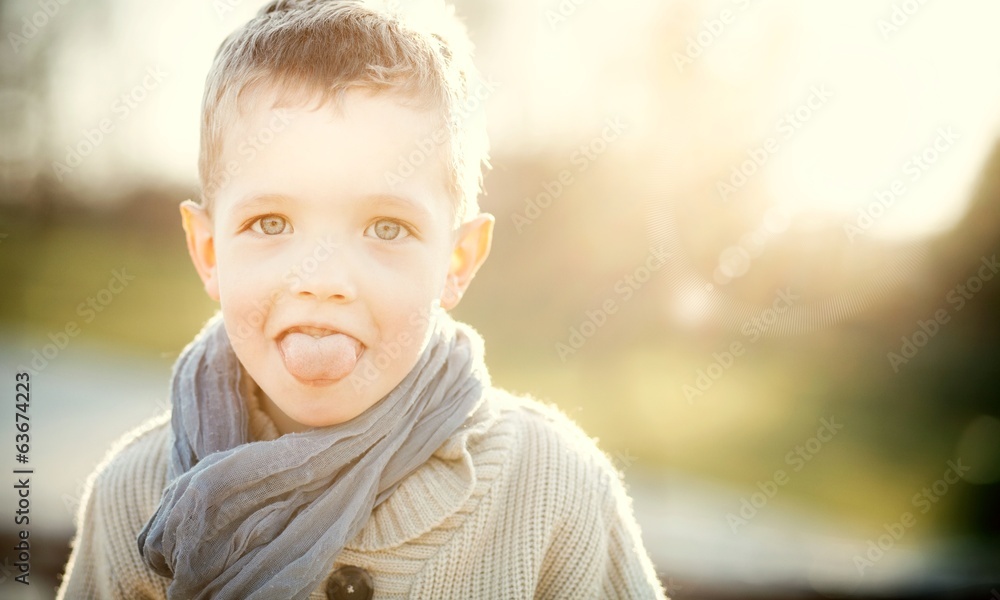 Child portrait, boy sticking out his tongue Child portrait, boy sticking out his tongue