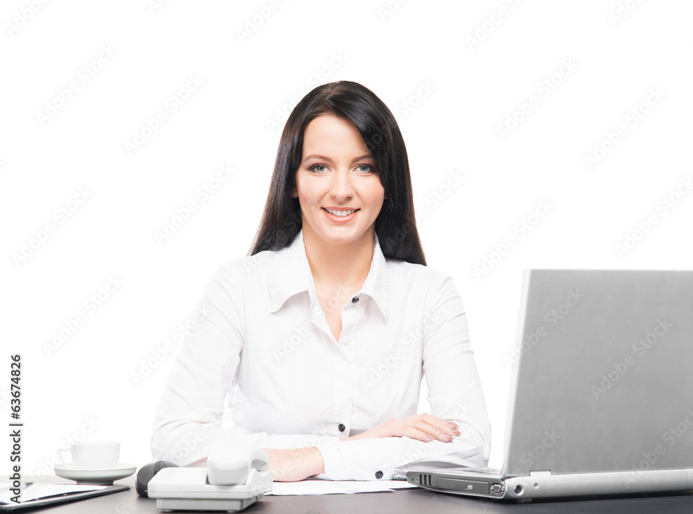 A businesswoman working in an office isolated on white A businesswoman working in an office isolated on white
