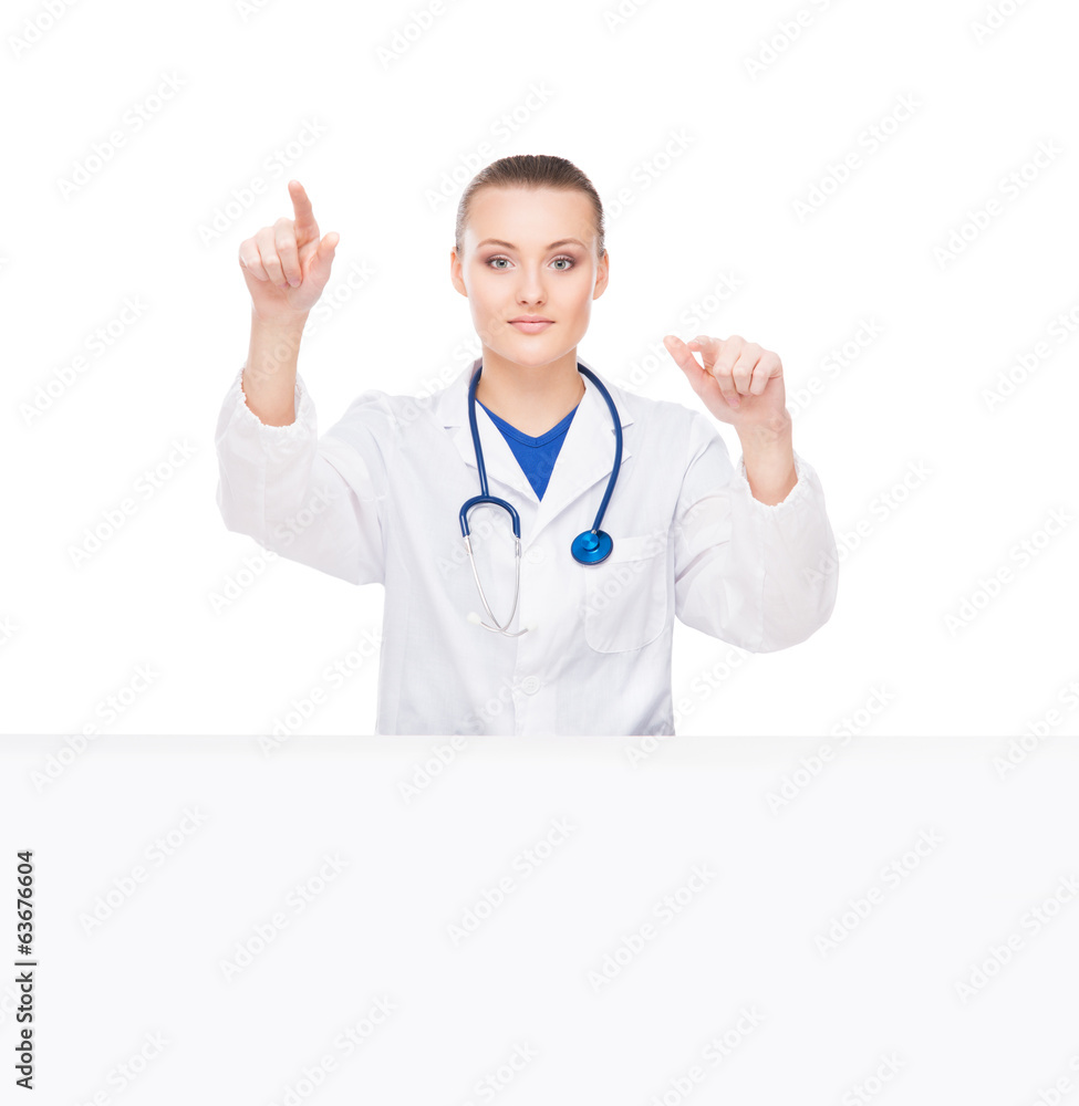 A professional doctor woman pushing an imaginary button A professional doctor woman pushing an imaginary button