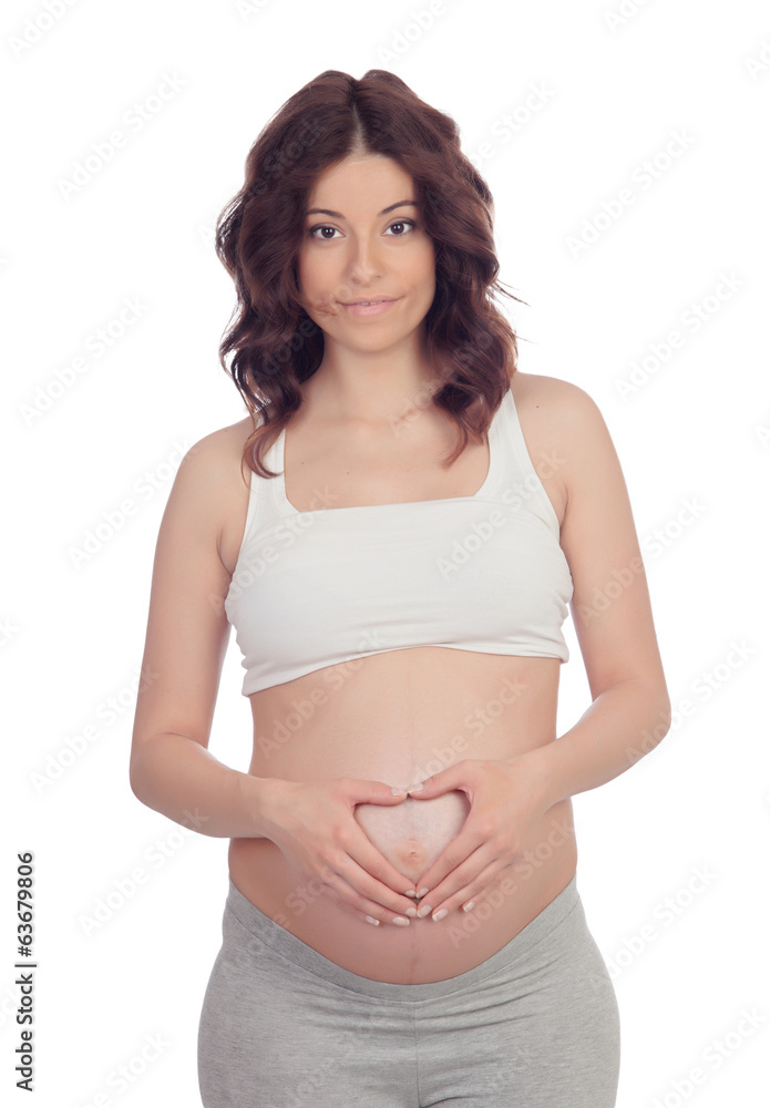 Pregnant woman forming a heart on her belly Pregnant woman forming a heart on her belly