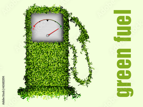 the concept of ecological fuel. Green fuel pump out of the grass