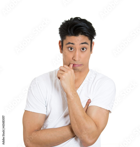 Portrait Clueless man sucking thumb isolated on white background