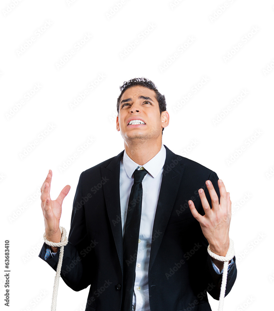 Corporate slavery. Business man with tied up hands Corporate slavery. Business man with tied up hands