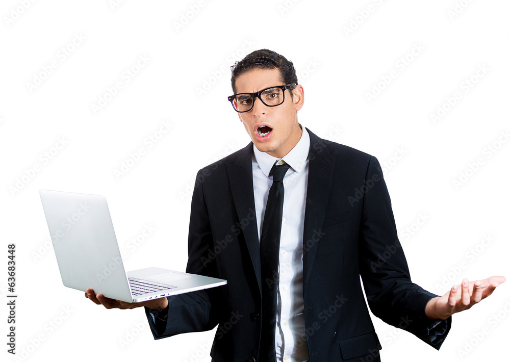 Surprised young business man. Bad news on computer Surprised young business man. Bad news on computer