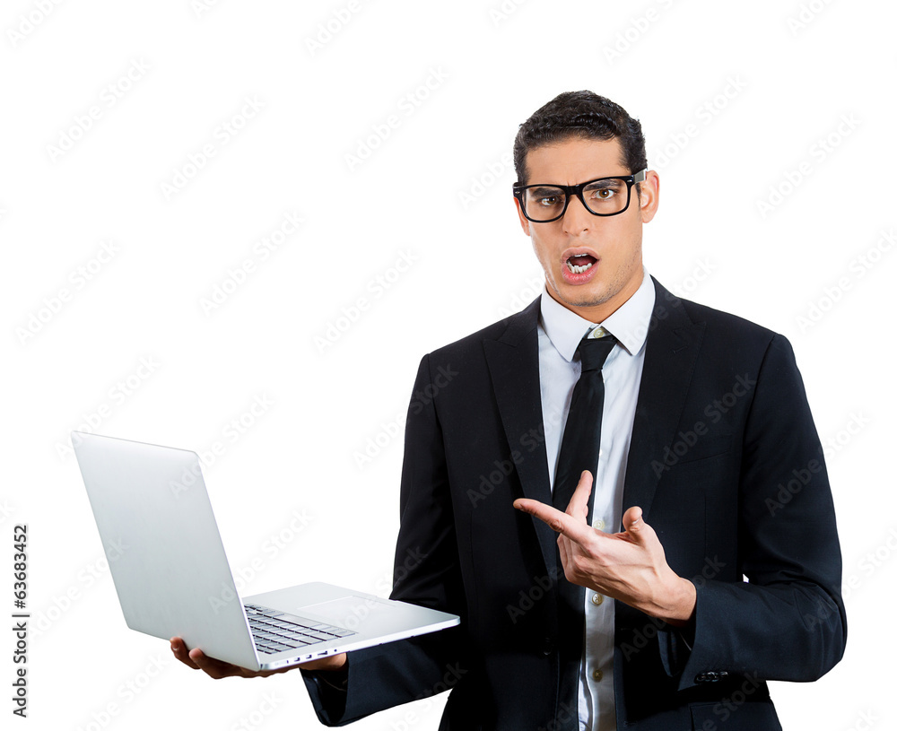 Surprised young business man. Bad news on computer Surprised young business man. Bad news on computer