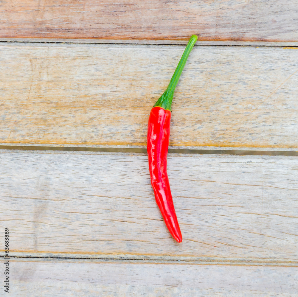 Chilli on wood background Chilli on wood background