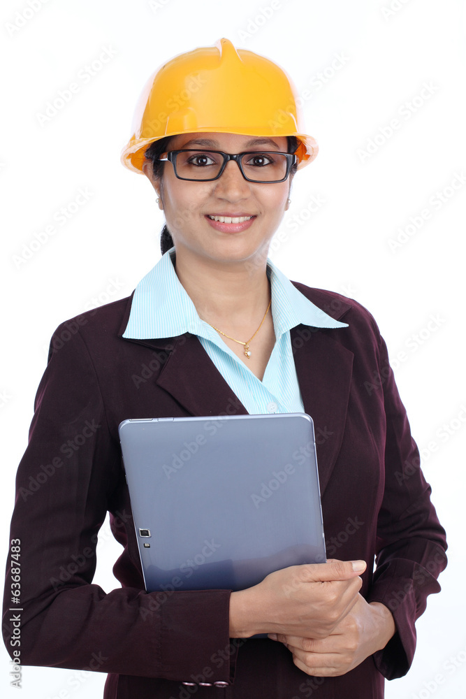 Young Indian female engineer with tablet computer Young Indian female engineer with tablet computer