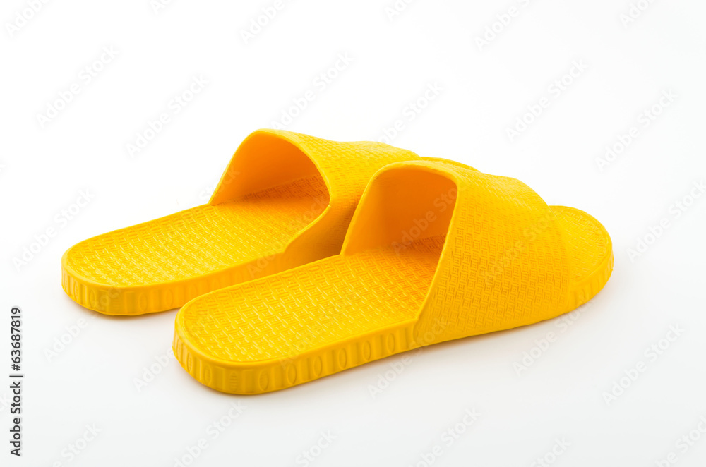 Yellow slippers isolated white background Yellow slippers isolated white background