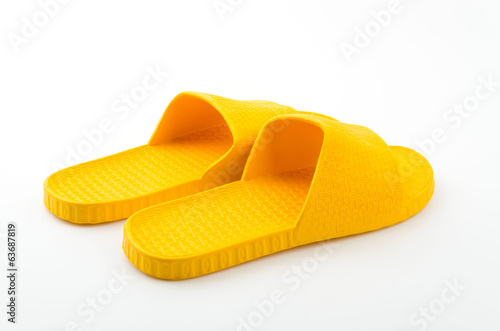 Yellow slippers isolated white background