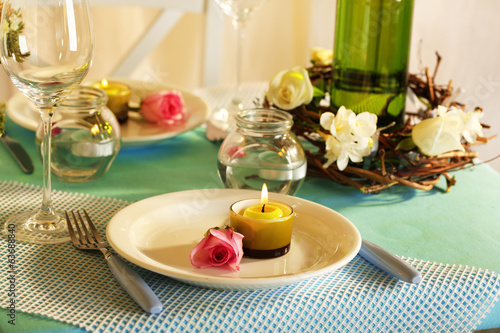 Beautiful holiday Easter table setting in blue tones,