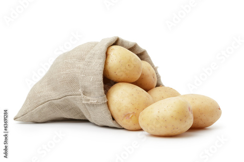 fresh young potato in sack bag