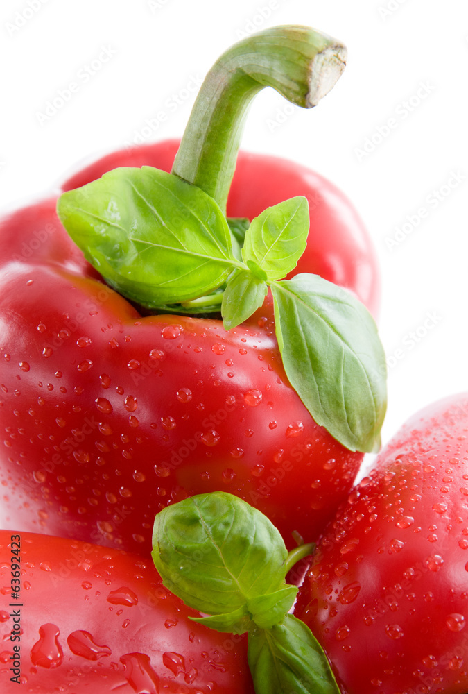 Pepper with leaf of basil Pepper with leaf of basil