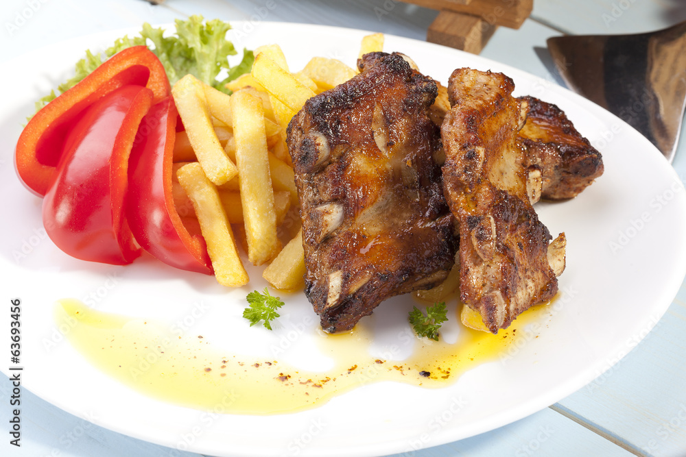 Grilled ribs on plate Grilled ribs on plate