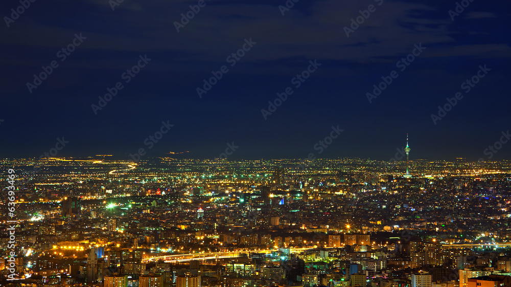 Illuminated Skyline of Tehran Against Dark Blue Sky Illuminated Skyline of Tehran Against Dark Blue Sky