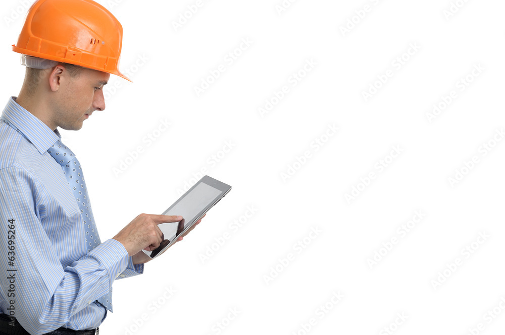 Young construction worker with digital tablet Young construction worker with digital tablet