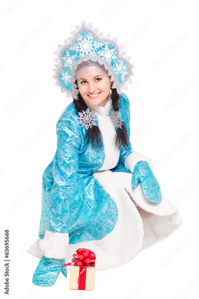 Young joyful woman posing in winter costume Young joyful woman posing in winter costume