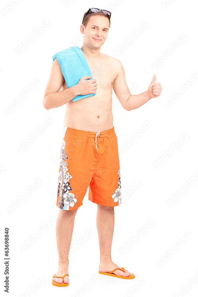 Man in swimsuit giving thumb up Man in swimsuit giving thumb up