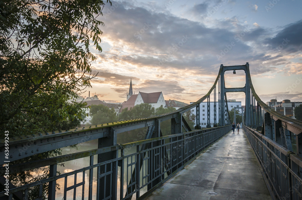 Fototapeta premium Sunset on a bridge over the Donau in Passau, Germany