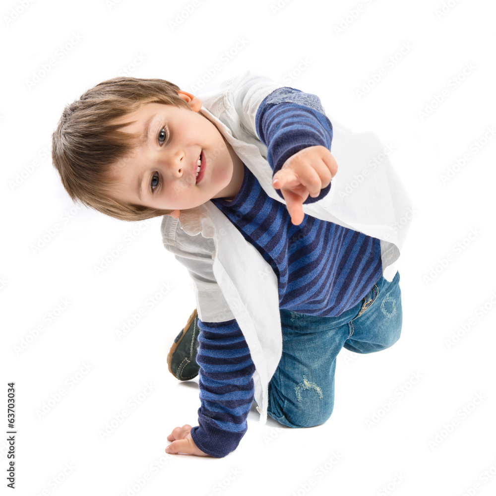 Boy pointing to the front over white background Boy pointing to the front over white background