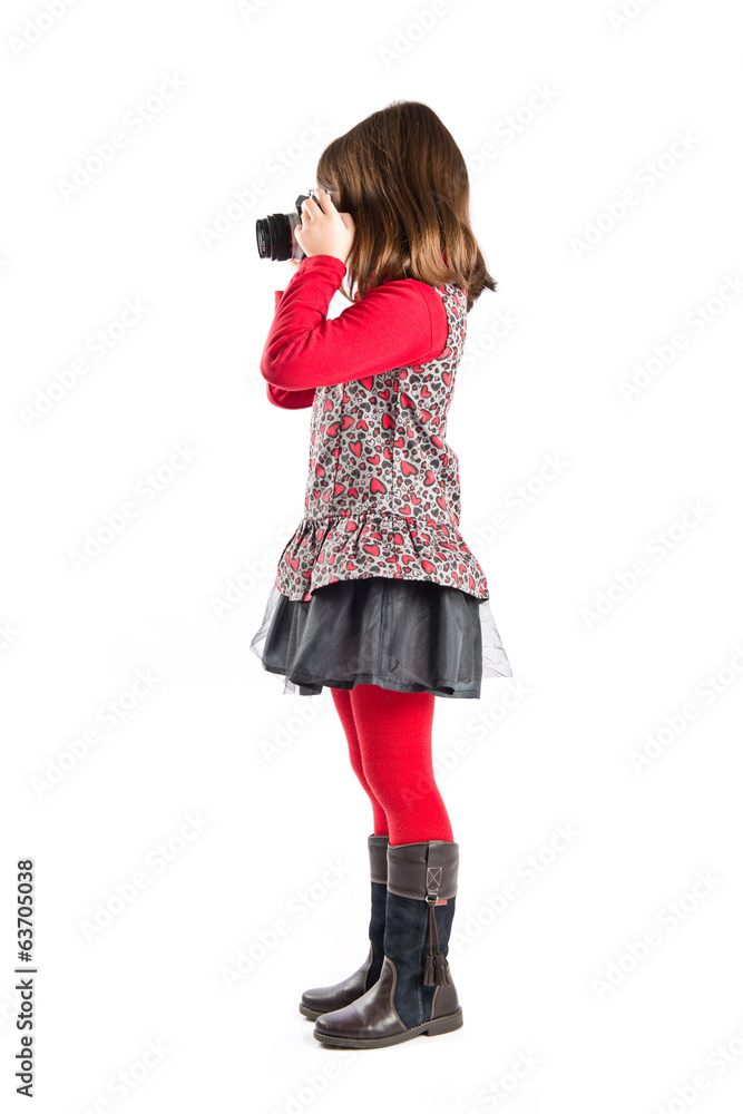 Girl taking a picture over white background Girl taking a picture over white background