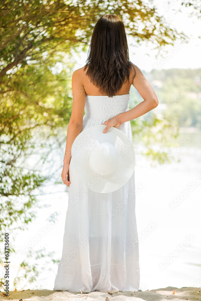 Beautiful woman in white dress