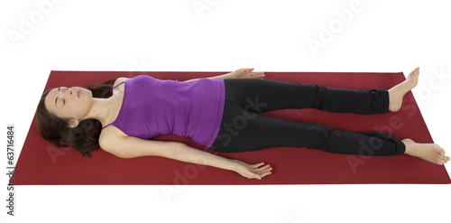 Woman resting in Shavasana