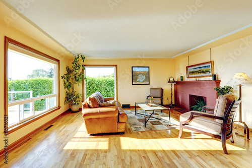 Living room with red brick fireplace