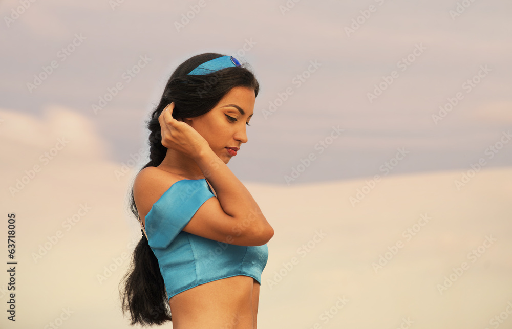 Eastern style portrait of a girl in belly dance costume Eastern style portrait of a girl in belly dance costume