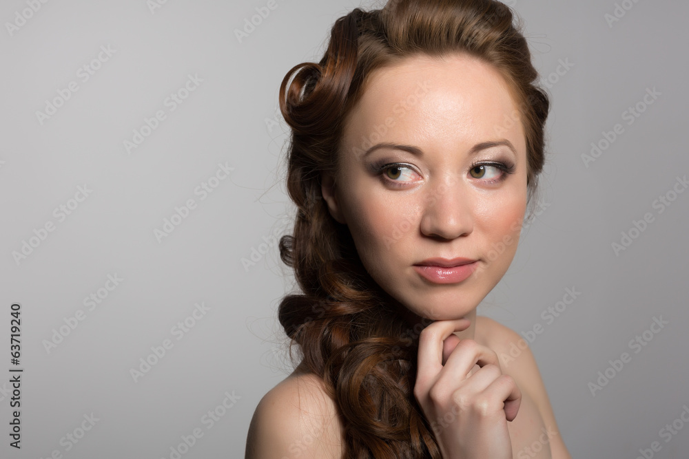 Naklejka premium Portrait of a girl wavy hair