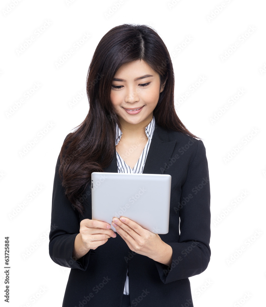 Asia businesswoman looking at tablet Asia businesswoman looking at tablet