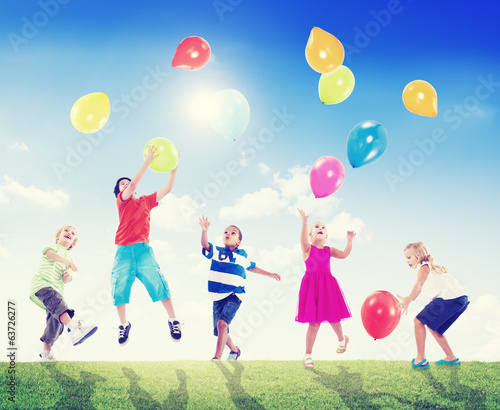Multi-Ethnic Children Outdoors Playing With Balloons