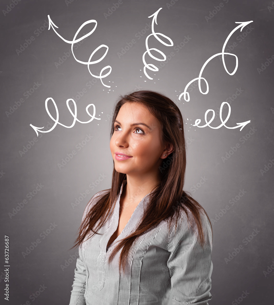 Young woman thinking with arrows overhead Young woman thinking with arrows overhead