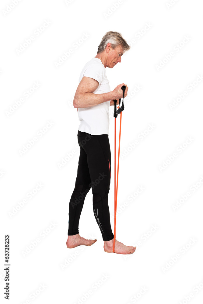 Senior fitness man exercising with orange elastics. Isolated on Senior fitness man exercising with orange elastics. Isolated on