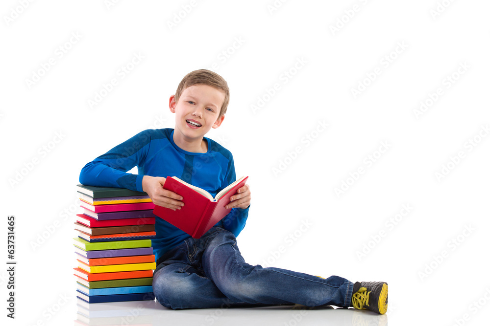 Schoolboy reading book Schoolboy reading book