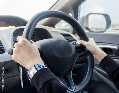 Woman Driving The Car