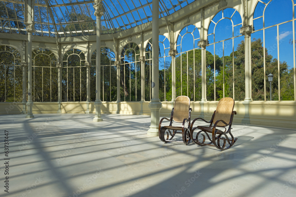 Two rocking chairs in the Crystal Palace in Madrid