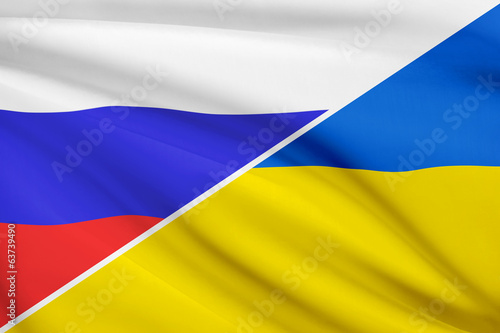 Series of ruffled flags. Russia and Ukraine.