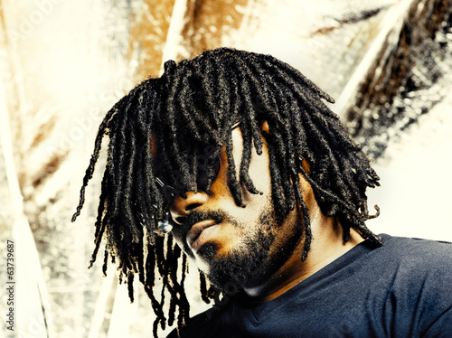 cool african guy with dreadlocks photo