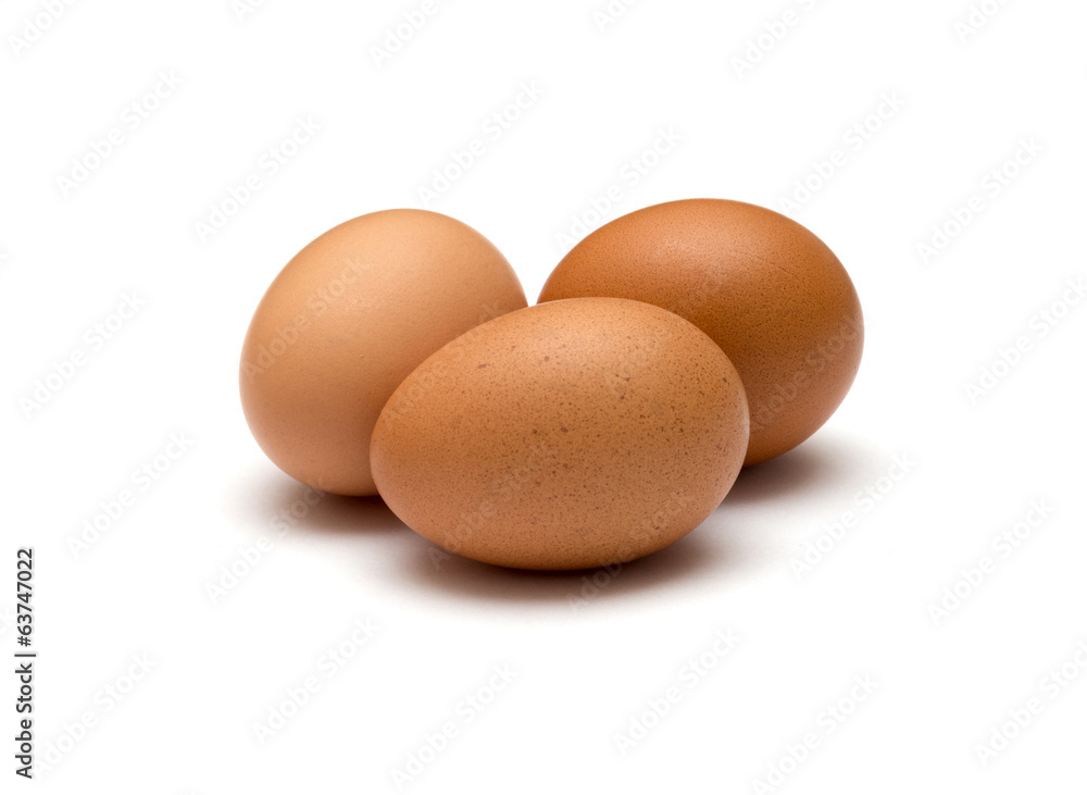 Three brown eggs isolated on white background Three brown eggs isolated on white background