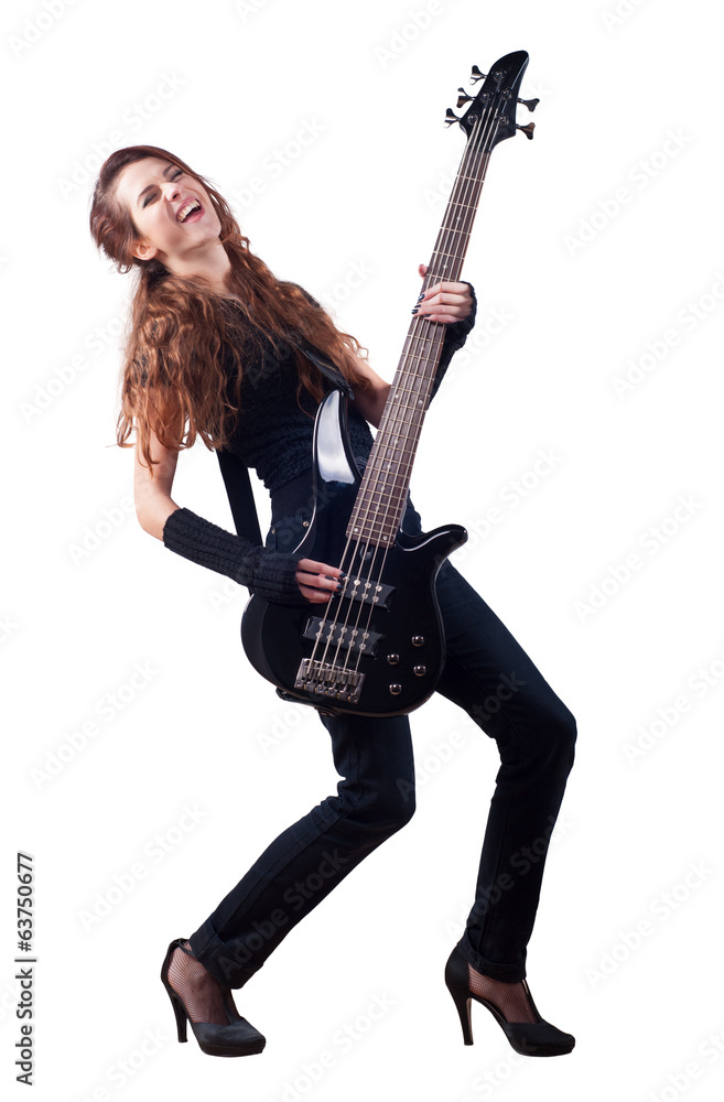 Beautiful girl with long red hair playing bass guitar Beautiful girl with long red hair playing bass guitar