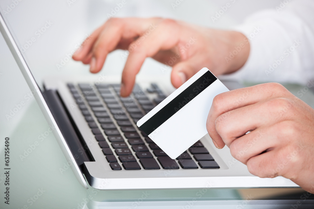 Man Shopping With Credit Card And Laptop Man Shopping With Credit Card And Laptop