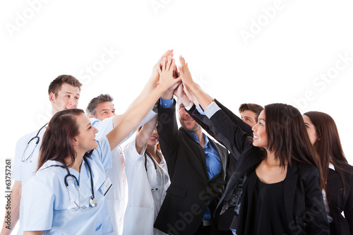 Doctors and managers making high five gesture