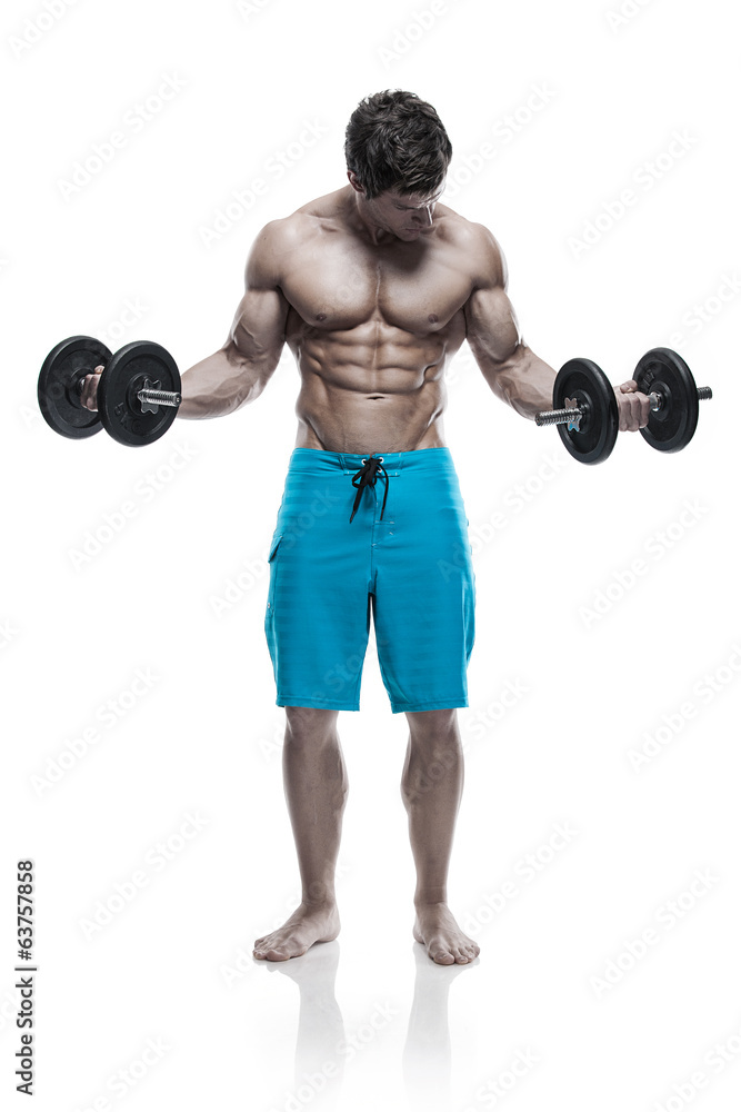 Muscular bodybuilder guy doing exercises with dumbbells over whi Muscular bodybuilder guy doing exercises with dumbbells over whi