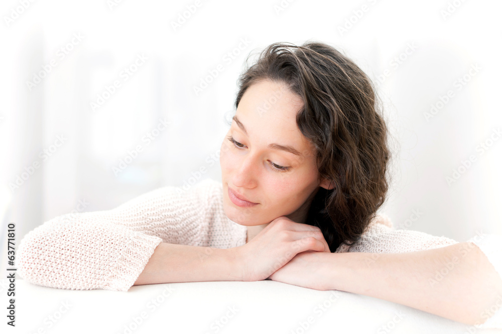 Portrait of an attractive thinking girl with curly hair Portrait of an attractive thinking girl with curly hair