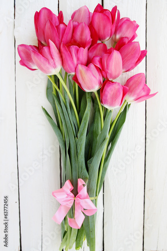 bouquet of tulips on white board