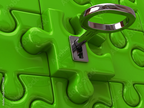 Silver key and green puzzle