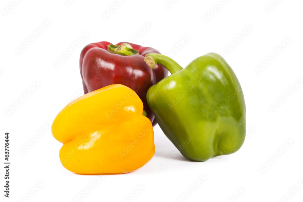 red green and yellow pepper isolated on white red green and yellow pepper isolated on white