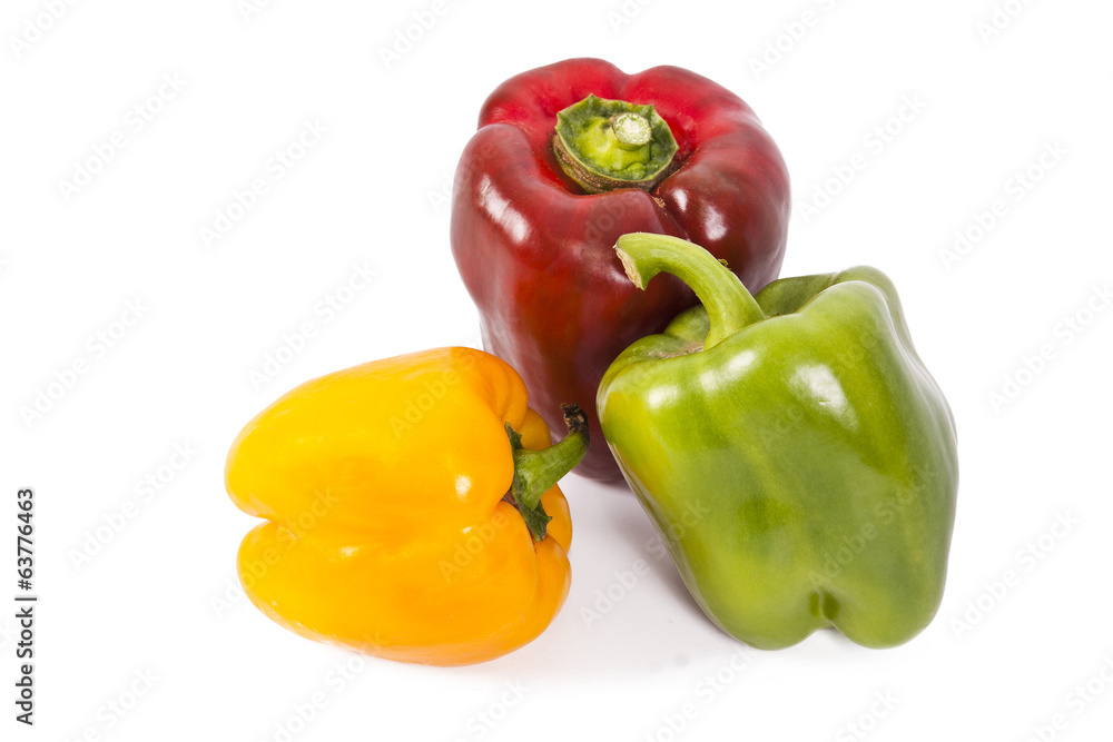 red green and yellow pepper isolated on white red green and yellow pepper isolated on white